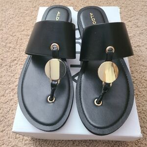 Aldo Black Slide Sandals with Gold Disc Detail